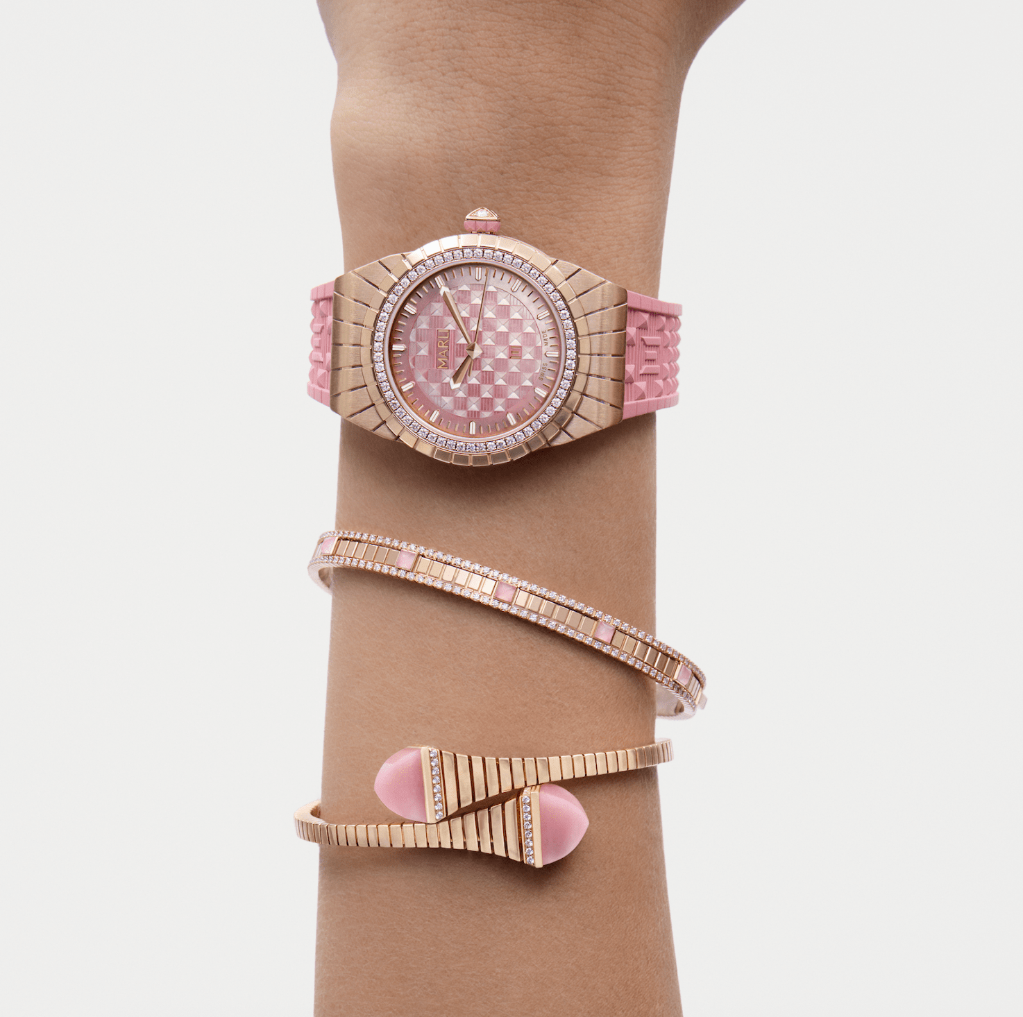 Montre rose et or avec bracelets assortis