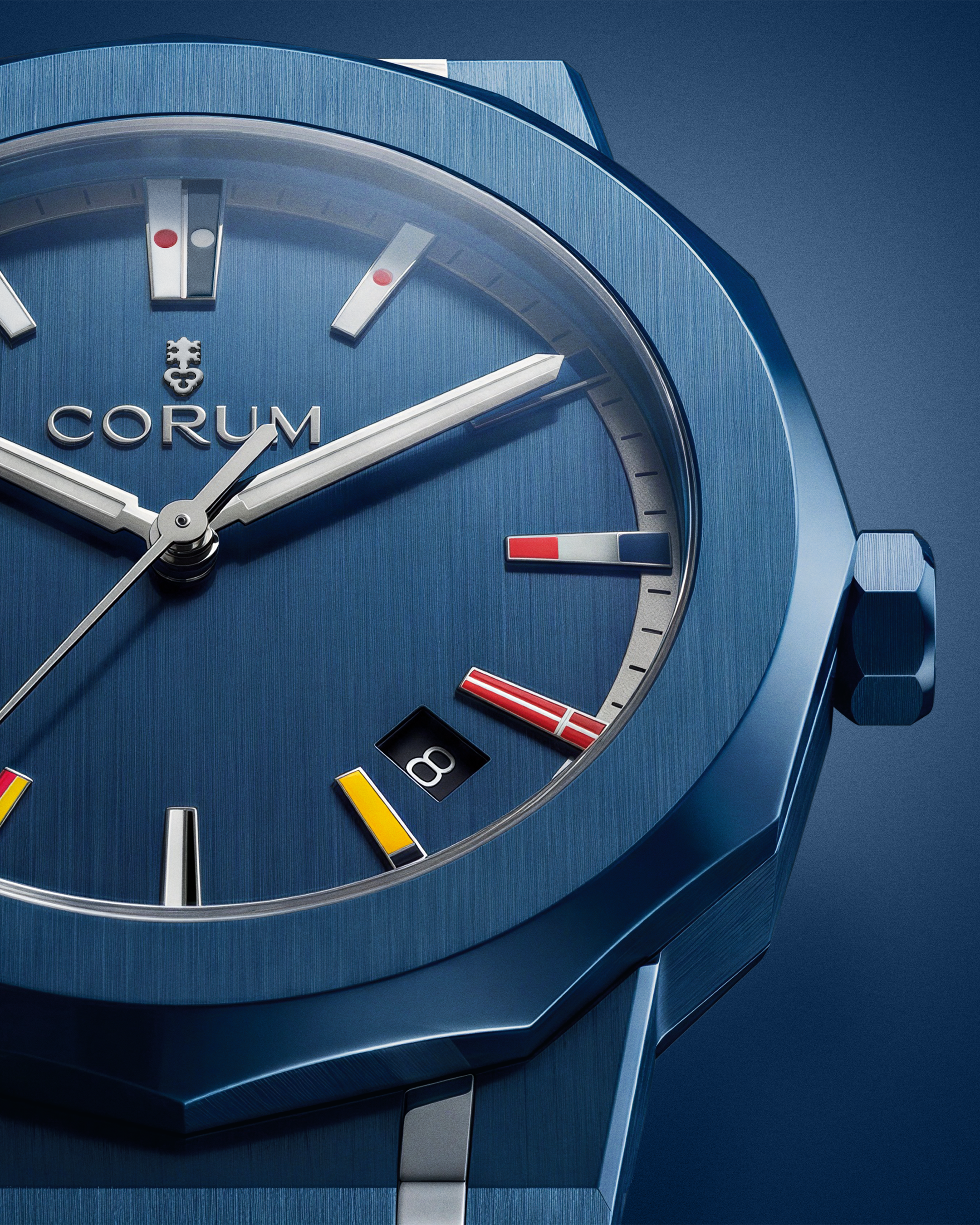 Gros plan d’une montre Corum bleue à cadran texturé