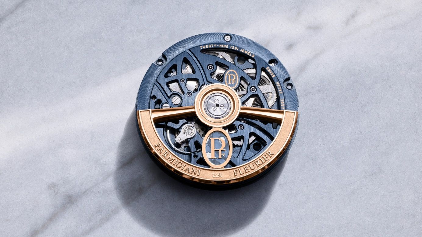 Mouvement de montre Parmigiani Fleurier ajouré bleu et or